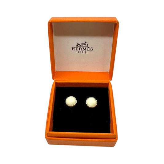 Hermes Eclipse Pierced Earrings Silver and White on Both Ears