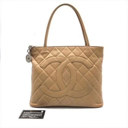 Chanel CC Logo Quilted Caviar Leather Tote Medallion Beige Silver