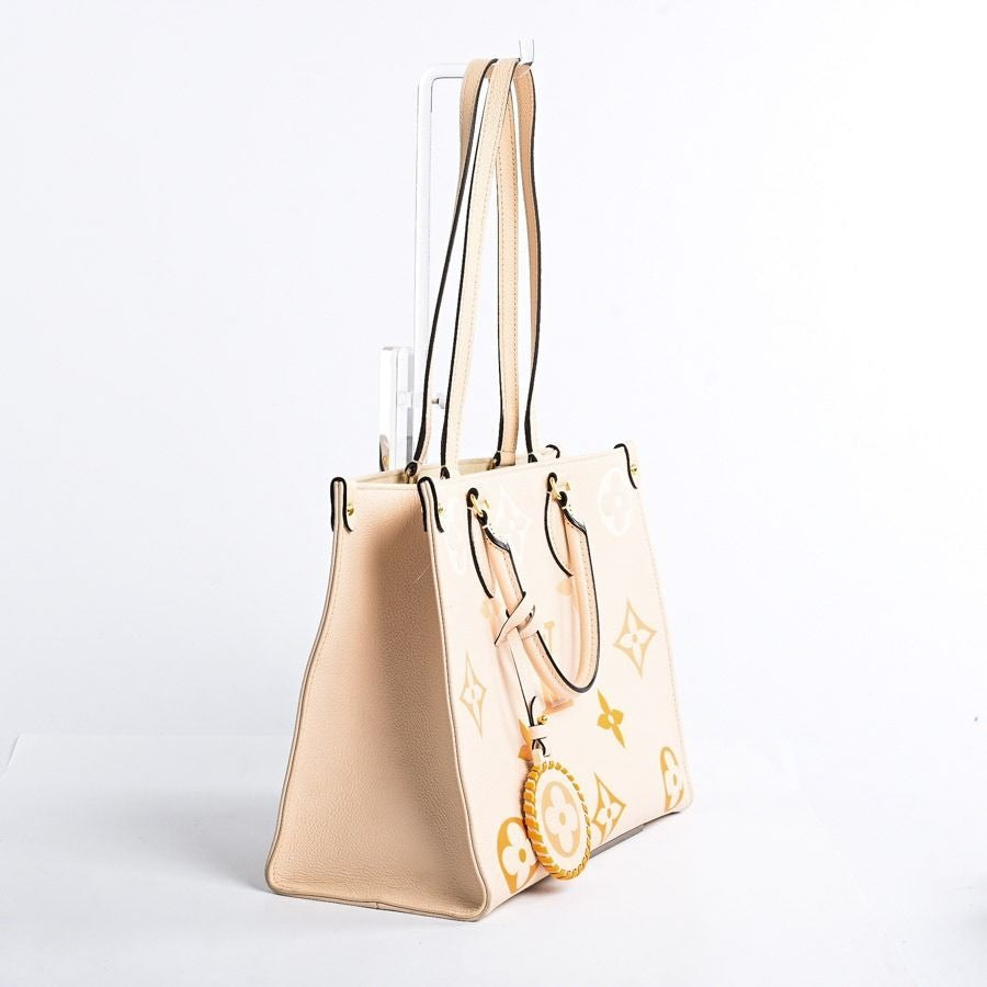 Louis Vuitton On The Go Tote Empreinte By The Pool Onthego MM Cream