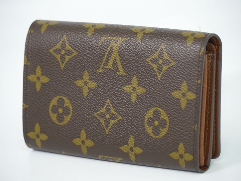Authentic Louis Vuitton LV Porte Monet Vier Trésor Monogram Fold Wallet Brown