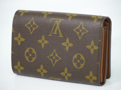 Authentic Louis Vuitton LV Porte Monet Vier Trésor Monogram Fold Wallet Brown