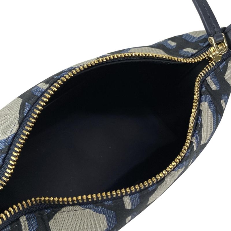 Dior/christian Dior Handbag Diortravel Nomad Pouch Navy And Beige Leather