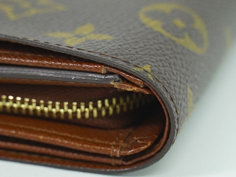 Authentic Louis Vuitton LV Porte Monet Vier Trésor Monogram Fold Wallet Brown