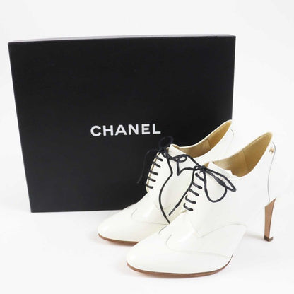 CHANEL 17A G33057 Lace-up Patent Leather Booties With Coco Mark White Gold