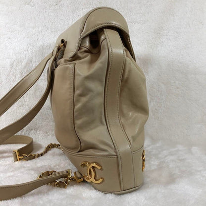 CHANEL CC Vintage Lambskin Beige Gold Backpack Bag Drawstring Chain