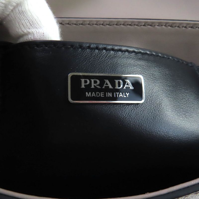 Prada 2vd065 Saffiano Leather Argilla Shoulder Bag With Triangle Logo Plate