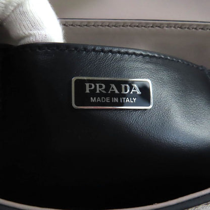 Prada 2vd065 Saffiano Leather Argilla Shoulder Bag With Triangle Logo Plate