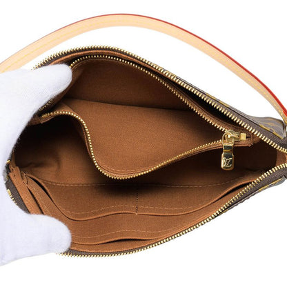 Louis Vuitton Pochette Handbag In Brown
