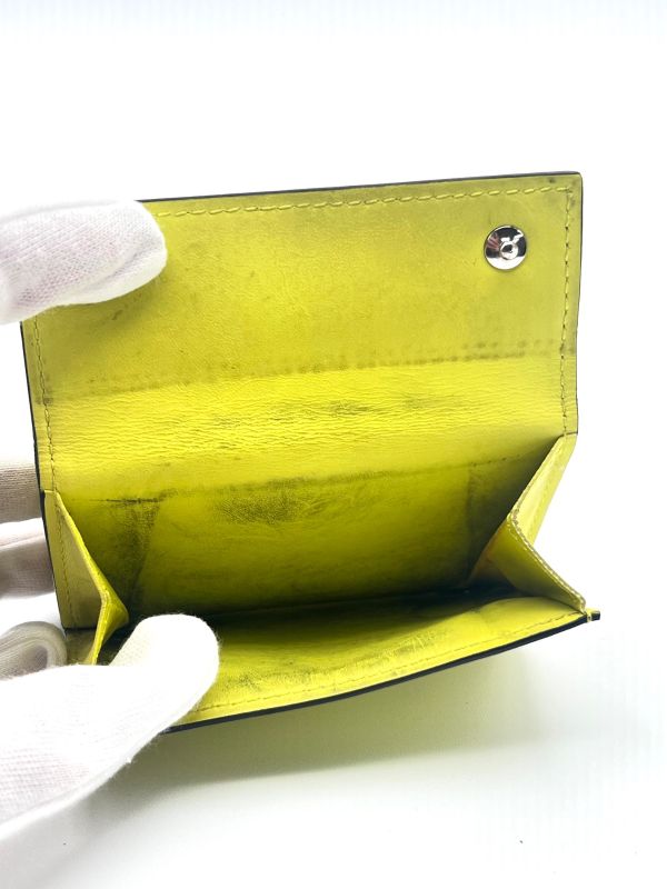 Louis Vuitton Wallet Trifold Wallet Taiga Llama Discovery Compact M67629