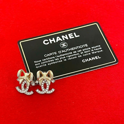 Chanel Coco Mark Ribbon Motif GP Rhinestone Earrings Accessories 24BK
