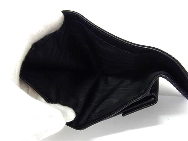 Prada 1m0840 Tessuto Nylon And Saffiano Leather Bifold Wallet Black