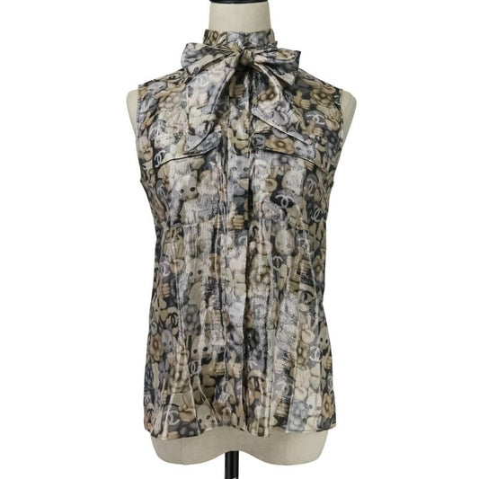 Chanel Choupette Coco Mark Print Sleeveless Silk Blouse with Ribbon Tie