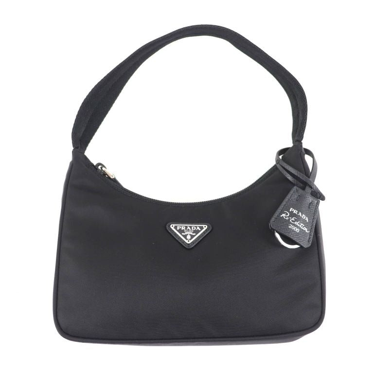 Prada 1 Ne515 re-Edition 2000 re-Nylon Mini Bag with Triangle Plate Charm One