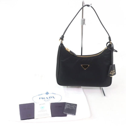 Prada Re-edition 2005 Re-nylon Triangle Logo Mini Nylon Handbag Black Gold
