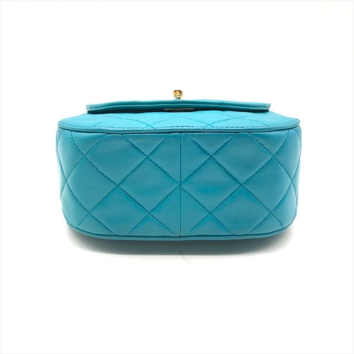 Chanel CC Logo Turnlock Quilted Lambskin Mini Hand Vanity Bag Blue