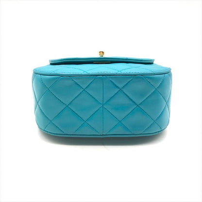 Chanel CC Logo Turnlock Quilted Lambskin Mini Hand Vanity Bag Blue