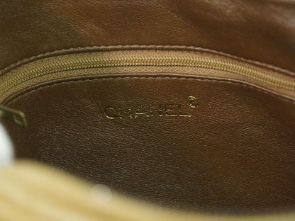 Authentic Chanel Coco Mark Tassel Shoulder Bag Pochette Lambskin Leather Beige