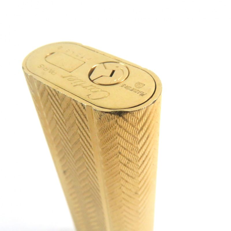 Cartier All-over Pattern Oval Form Roller Type Smoking Goods Gas