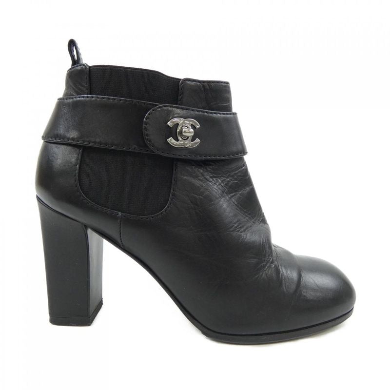 Chanel Turnlock Boots