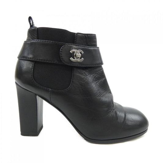 Chanel Turnlock Boots