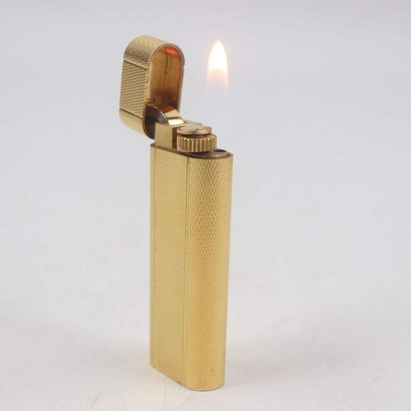 Cartier Oval All-over Roller Gas Lighter Gold Swiss Made Men's Ignition