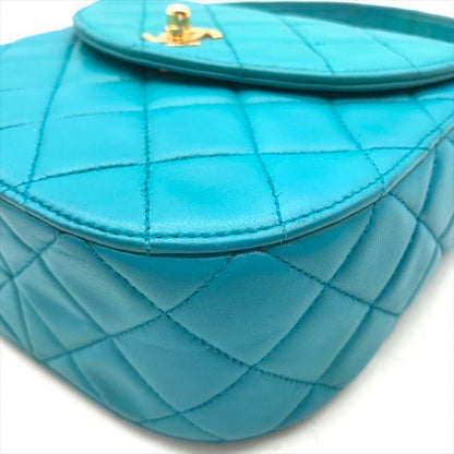 Chanel CC Logo Turnlock Quilted Lambskin Mini Hand Vanity Bag Blue