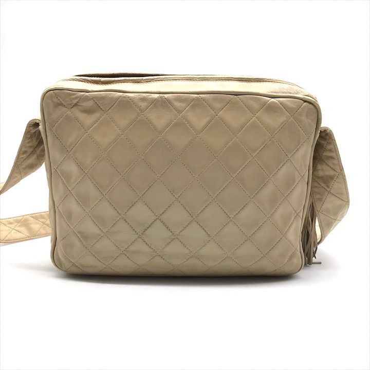 Chanel CC Logo Quilted Lambskin Fringe Shoulder Bag Beige Purse
