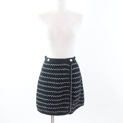 CHANEL P49277 Trapezoidal Wrap Skirt With Coco Mark Buttons Black White 34 Made