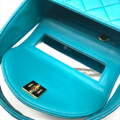 Chanel CC Logo Turnlock Quilted Lambskin Mini Hand Vanity Bag Blue