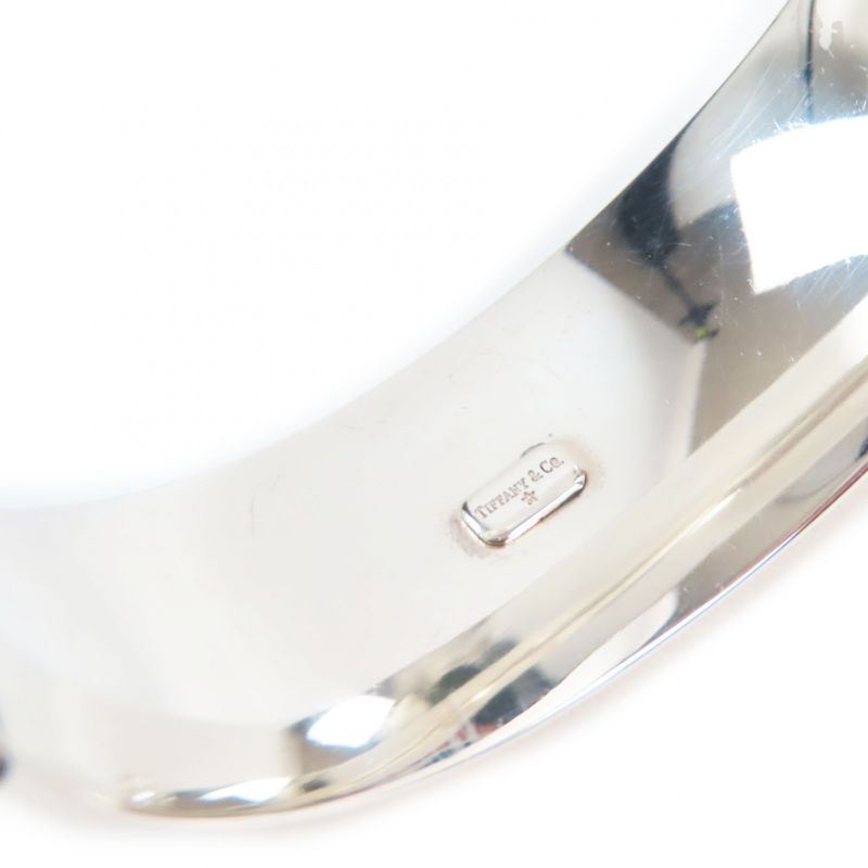 Tiffany & Co 1940s Vintage 3 Star Bangle 3 Star Bangle With Ruby Diamond And