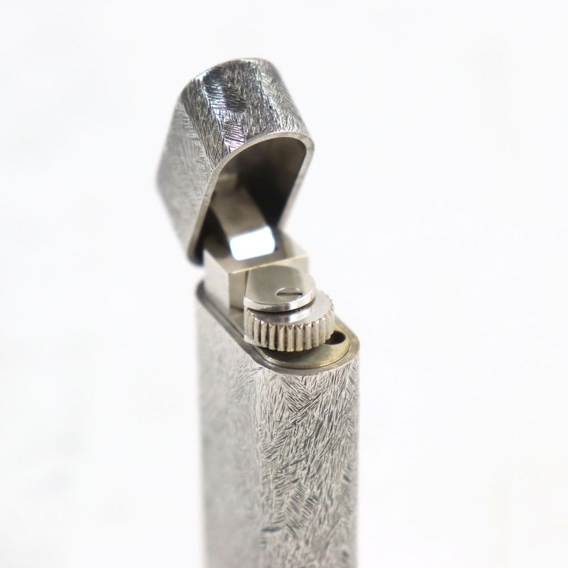 Cartier Allover Pattern Oval Form Roller Lighter Silver Men's