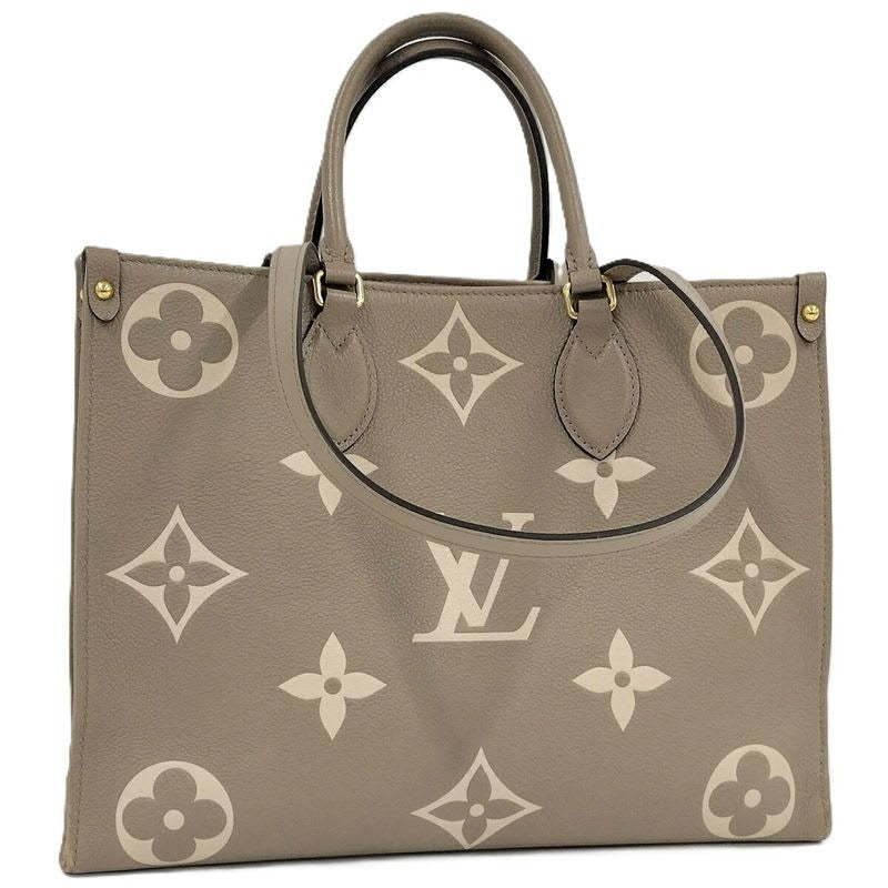 Louis Vuitton On The Go MM 2-Way Handbag Bicolor Monogram Empreinte Tourtrail