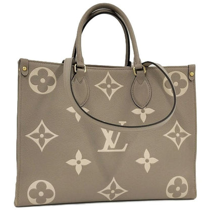 Louis Vuitton On The Go MM 2-Way Handbag Bicolor Monogram Empreinte Tourtrail
