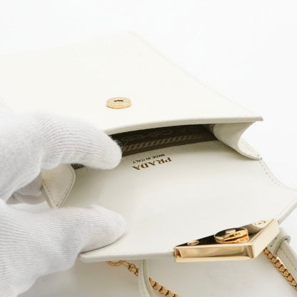 Prada Phone Accessory White Gold Saffiano Mini Bag Triangle Logo