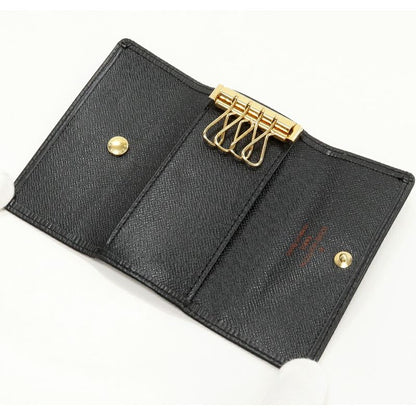 Louis Vuitton 4-ribbon Key Case Epi Noir Black Gold Hardware Multicles 4 — view 3