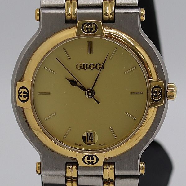 Gucci Quartz Gold Dial Date Watch Tam