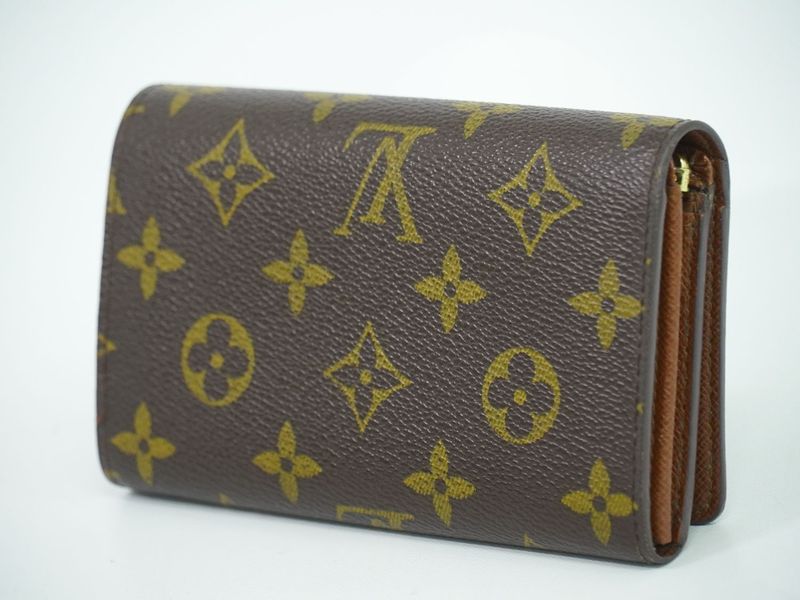 Authentic Louis Vuitton LV Porte Monet Vier Trésor Monogram Fold Wallet Brown