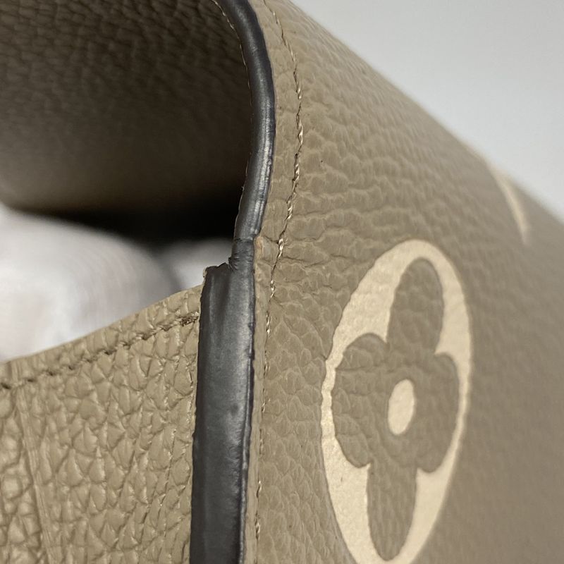 Louis Vuitton Long Wallet Monogram/empreinte Bicolor Portefeuille Sarah M81049