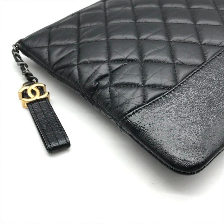 Chanel CC Logo Quilted Gabriel Lambskin Hand Clutch Black