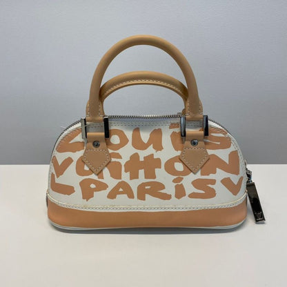 Louis Vuitton Alma Oriental Handbag