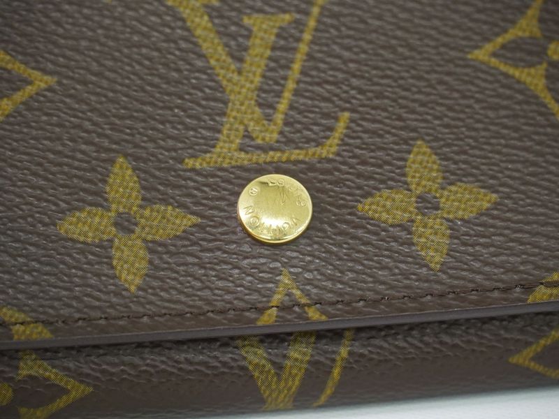 Authentic Louis Vuitton LV Porte Monet Vier Trésor Monogram Fold Wallet Brown