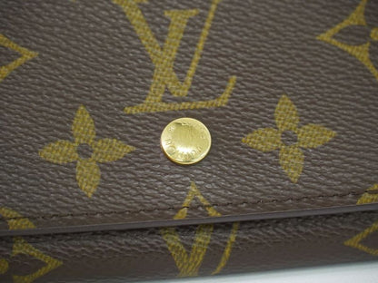 Authentic Louis Vuitton LV Porte Monet Vier Trésor Monogram Fold Wallet Brown
