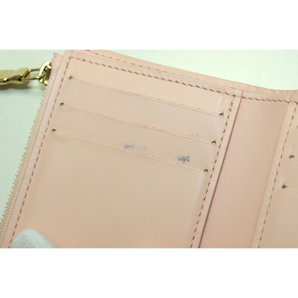 Louis Vuitton Portefeuille Victorine Leather Trifold Wallet — view 9