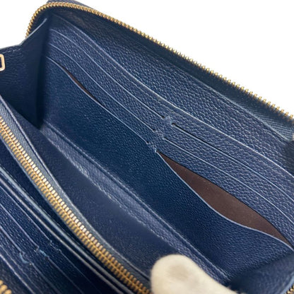 Louis Vuitton Empreinte Leather Zippy Wallet Navy Embossed Monogram Pattern