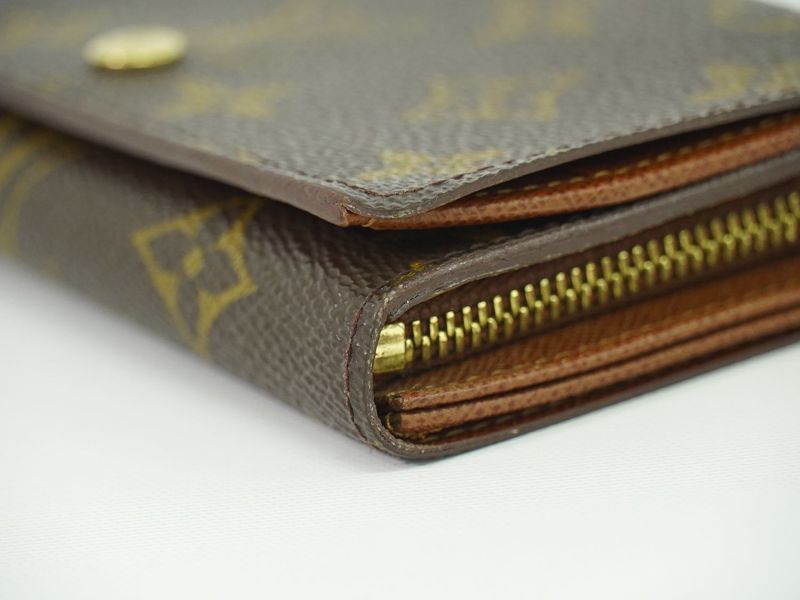Authentic Louis Vuitton LV Porte Monet Vier Trésor Monogram Fold Wallet Brown