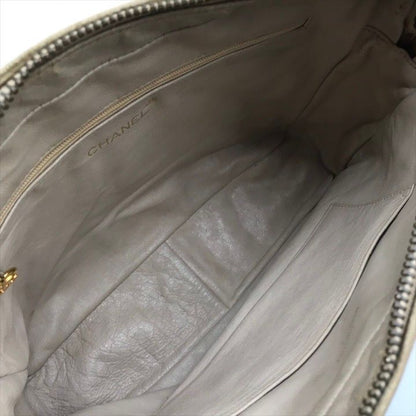 Chanel CC Logo Quilted Lambskin Fringe Shoulder Bag Beige Purse
