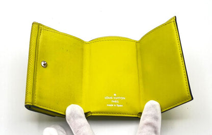 Louis Vuitton Wallet Trifold Wallet Taiga Llama Discovery Compact M67629