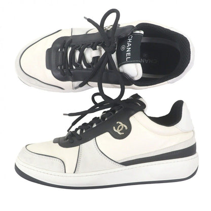 Chanel Leather Suede CC Logo Low Cut Sneakers Ivory Black — view 3