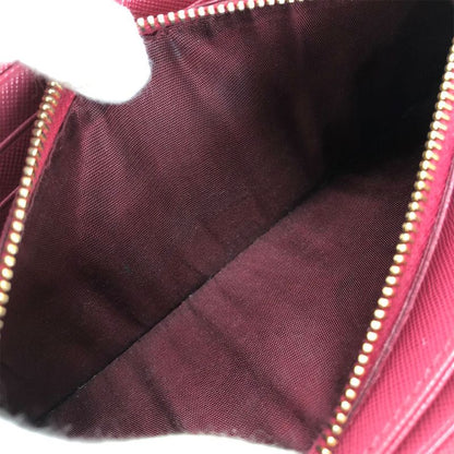 Prada Long Wallet Saffiano Pink Peonia Gold Hardware Round Zipper Ribbon Ladies