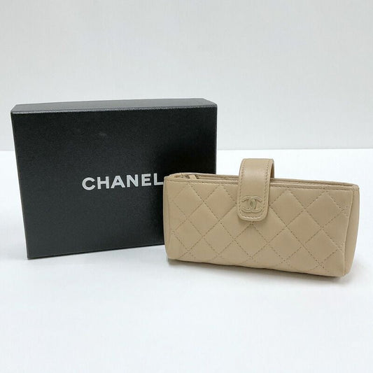 Chanel Quilted Mini Pouch Handbag Lambskin Beige Gold